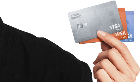 The hand holds 3 branded Visa cards